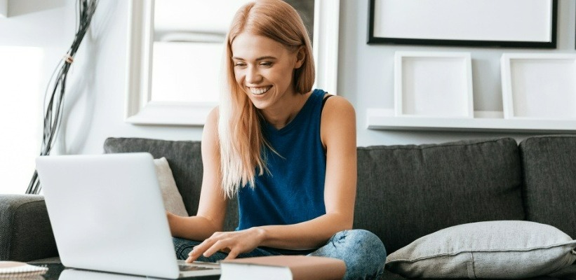 a woman viewing her laptop